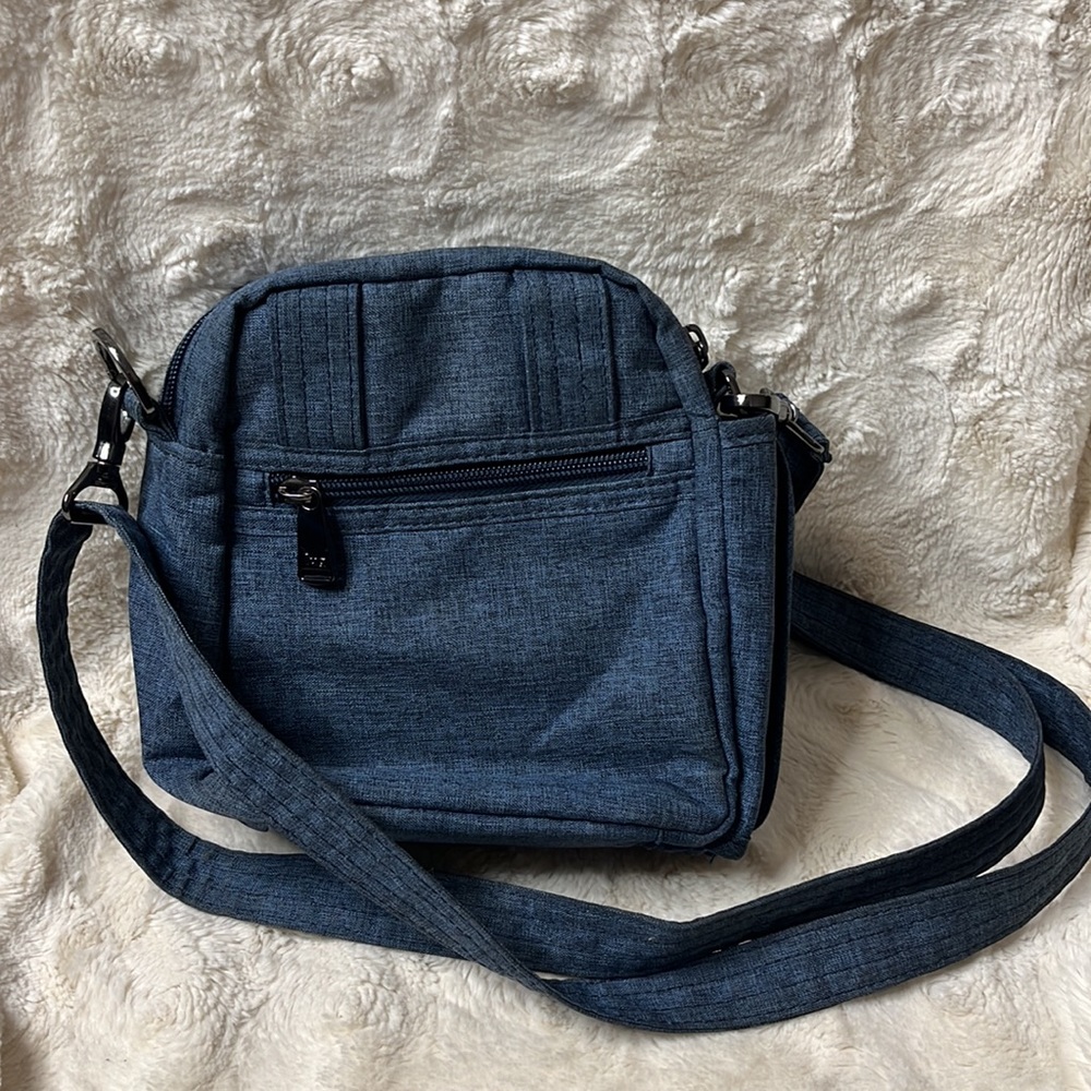 Lug crossbody. Looks like denim. Adjustable strap - Picture 3 of 15